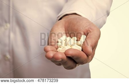Multivitamins Pills Closeup. Multivitamins And Medications. Hands Hold Multivitamins