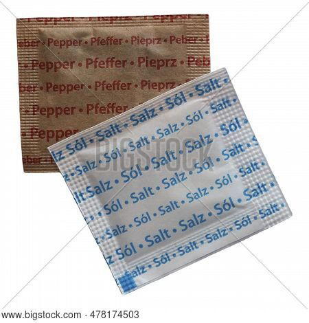 Individual Salt And Pepper Sachet Isolated Over White