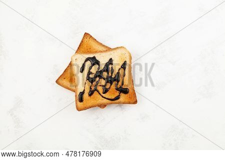 Breakfast Toast With Spread Or Pasta, Top View. Toasted Slices Of Wheat Bread.