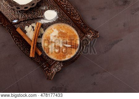 Salep Drink Also Known As Sahlep Or Sahlab. Turkish Traditional Hot Drink On Brown Metal Tray, Top V