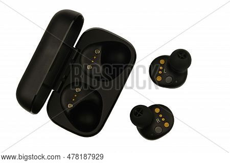 Wireless Stereo Earbuds. Black Wireless Earphones And Charging Case. Earbuds Or Headphones And Charg