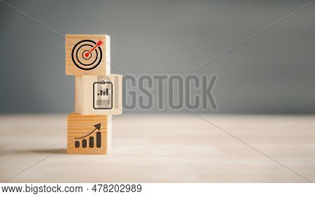 Cube Wood Blocks With Target Icon On Top, Accompanied By Rise Up Arrows. Steps Represent The Vertica