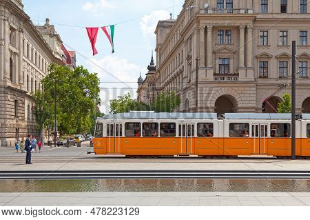 Budapest, Hungary - June 21 2018: Tramway Passing Alongside The Kossuth Lajos Square (hungarian Parl