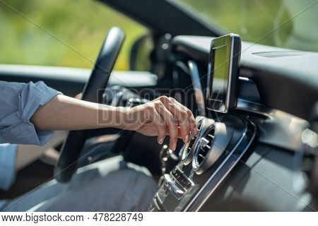 Heat And Car Driving. Female Hand Checking Flow Cold Air From Conditioner, Suffering From Summer Hot