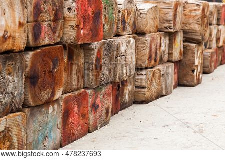 Logging On An Industrial Scale. Warehouse Of Wooden Blocks. Warehousing Of Wooden Beams.