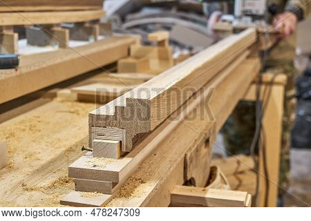 Carpenter Milling Wooden Handrail With Router Manual Milling Machine In Workshop Close Up. Handyman 