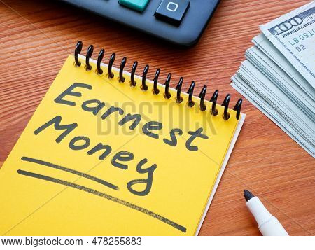 Earnest Money Memo In The Yellow Notepad.