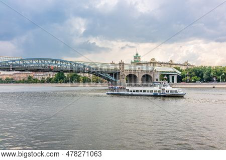 View Of The Moscow River Embakment, Pushkinsky Bridge And Cruise Ships At Sunset.