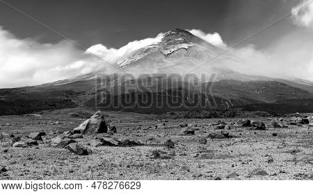 The Cotopaxi Volcano, Fields And Meadows, Rocks And Moving Straw, All Part Of A Wonderful Scene At T
