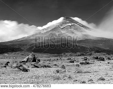 The Cotopaxi Volcano, Fields And Meadows, Rocks And Moving Straw, All Part Of A Wonderful Scene At T