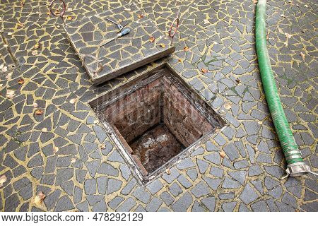 Next To A Large Building For The Students, The Cesspool Overflows