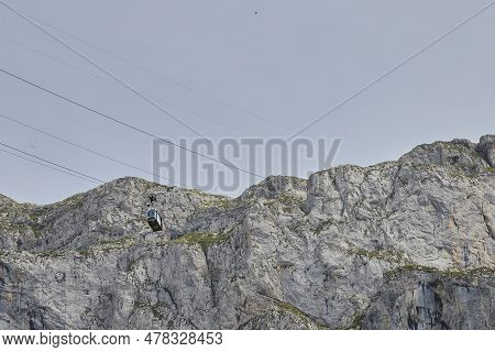 Fuente Dé (spain), June 16, 2023. Cable Car Cabin. A Cabin Descends From The Top Of The Picos De Eur