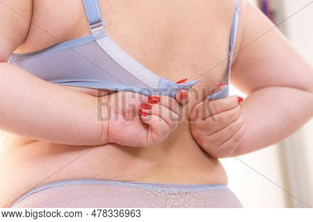 Woman Wearing Bra. Back View