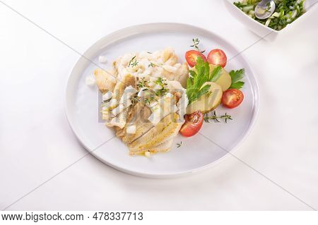 White Fish On A Plate. Beautifully Served Fish On A Plate With Vegetables And . High Quality Photo