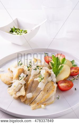 White Fish On A Plate. Beautifully Served Fish On A Plate With Vegetables And . High Quality Photo