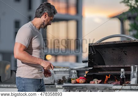 Grill Cook. Chef With Bbq Cooking Tools. Barbecue And Grill. Picnic And Barbecue Party. Chief Cook W