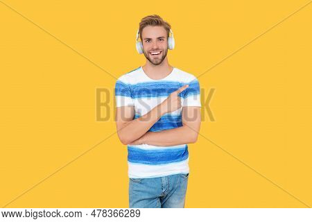 Smiling Young Estudy Man Attends An Online Lecture. An Estudy Man Wearing Headphones. Estudy Man Tak
