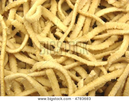 A Close Up View At Uncooked Wholemeal Spaetzle