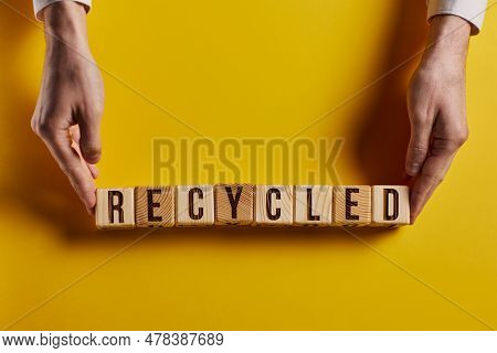 Recycled Word Written On Wood Block. Recycle Text On Cement Table For Your Desing, Concept
