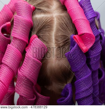 Curlformers Or Soft Curler Spirals On The Head Girl, Close-up. Hair Curling Spirals. Fashion Accesso