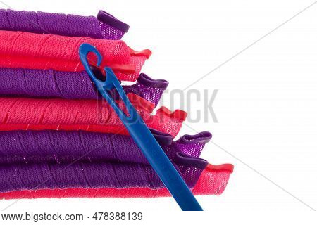 Soft Curler Spiral Or Curlformers On White Background, Close-up. Hair Curling Spirals.