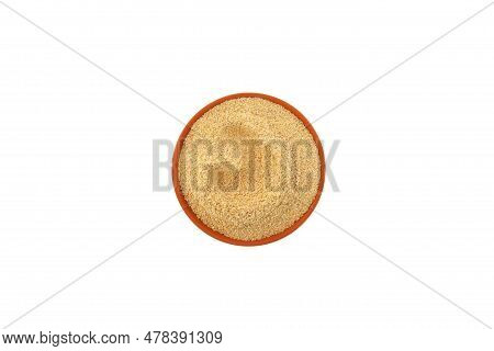 Hulbah Powder Or Fenugreek Flour In Ceramic Plate Isolated On White Background, Top View. Herbal Nut