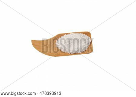 Food Additive E211 On Wooden Scoop, Isolated On White, Top View. Sodium Benzoate, Sodium Salt Of Ben