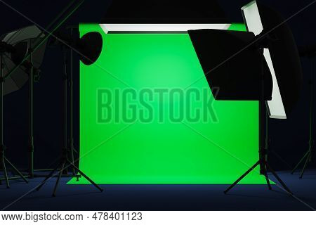 Studio Spotlights, Dark Photo Room With Professional Equipment And Mock Up Green Cyclorama Screen. T