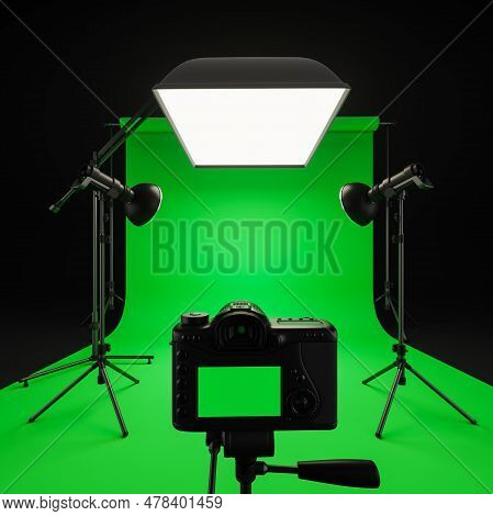 Interior Of Broadcast Studio With Green Screen Chromakey, Monolights And Camera Standing On Tripod I