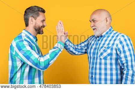 Photo Of Two Happy Generation Friends Giving Five With Hands. Five Of Two Generation Friends
