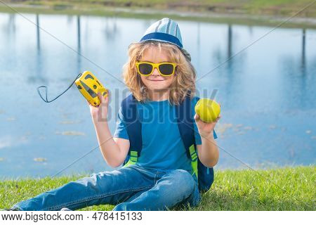 Scout Boy Wearing Explorer Hat And Backpack Outdoor. Explorer And Adventure With Binocular.