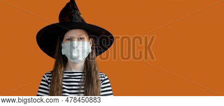 Halloween Kids Mask. Teen Girl In Witch Costume And Black Hat. Child In Protective Medical Mask Wavi