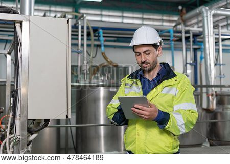 Mechanic Or Maintenance Or Electrical Engineer Checking Main Electrical Control Systems Industrial P
