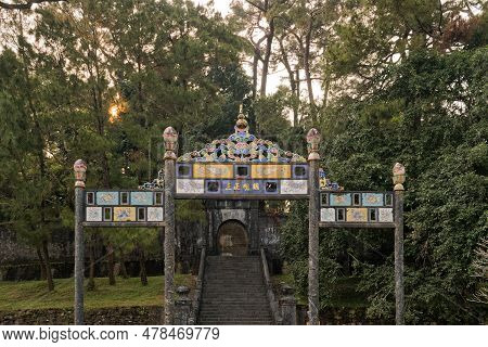 Hue, Vietnam - March 21, 2023: The Traditional Copper Gate In Front Of The Mound Or The Place Where 