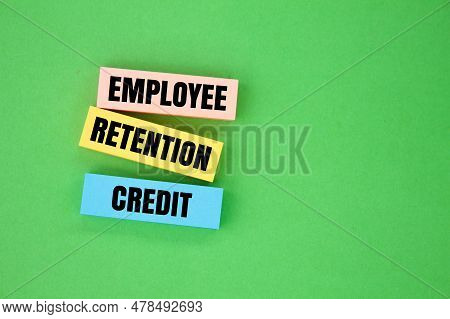 Colored Paper With The Word Employee Retention Credit. The Concept Of Employee Salary Retention