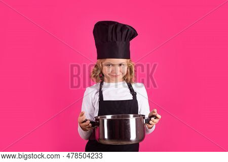 Child Chef Cook With Cooking Pot. Chef Child Preparing Healthy Food. Studio Portrait Of Child With C