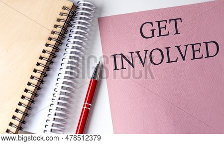 Get Involved Word On Pink Paper With Office Tools On White Background