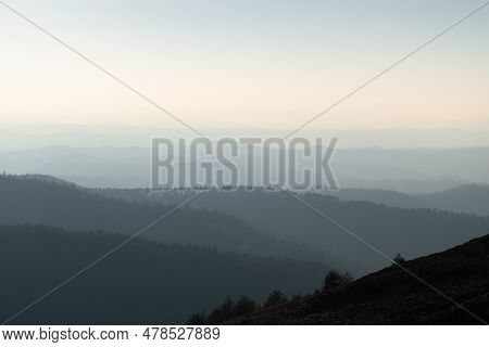 Landscape Of Mountain Layers In Haze, Fading In Distance, View From Mountain Ljubic Near Prnjavor