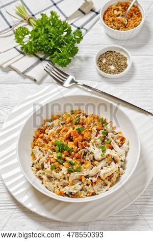 Chicken Rice Casserole D Iberville Topped With French Fried Onion And Crumbled Crackers In Bowl On W