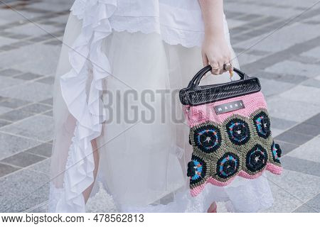 Paris, France - October, 3, 2021: Woman Wears Handbag Marni Leather Shoulder Bag, Street Style Detai