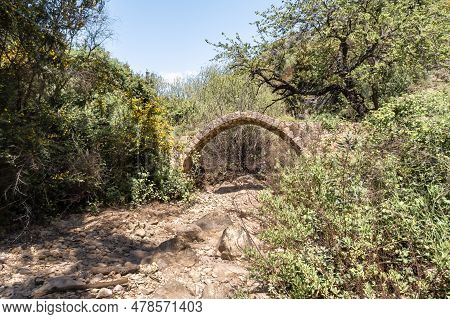 Remains Of An Old Ruined Abandoned Bridge In The Nahal Amud National Natural Park In Western Galilee