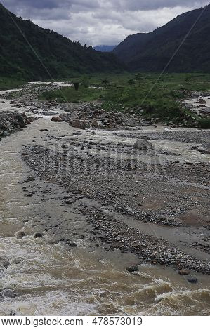 Beautiful River Valley, Flowing Stream, Forest And Himalaya Foothills Of Terai - Dooars Region. Bird