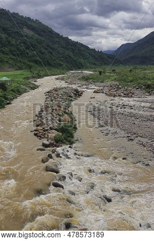 Beautiful River Valley, Flowing Stream, Forest And Himalaya Foothills Of Terai - Dooars Region. Bird