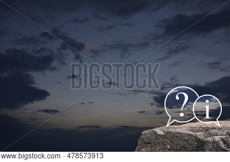 Question Mark And Information Chat Icon On Rock Mountain Over Sunset Sky, Technology Customer Servic