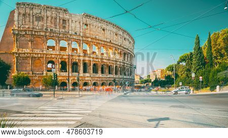 Rome, Italy. Colosseum. Traffic Near Flavian Amphitheatre. Famous Touristic World Landmark. Bright B