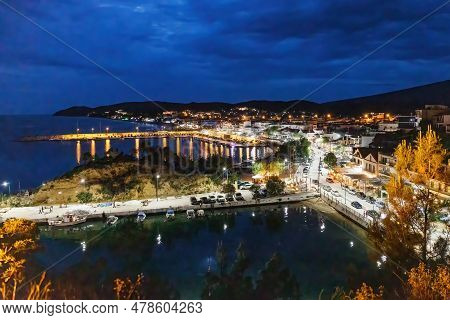 Panoramic Night View Of Limenaria Harbor City Of Thasos Island Greece In The North Aegean Sea.