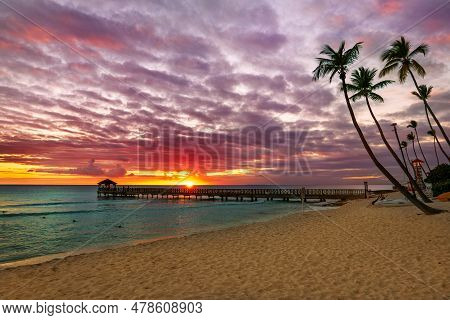 Beautiful Caribbean Beach In Dominican Republic. Sunset View Of Tropical Idyllic Summer Landscape Wi