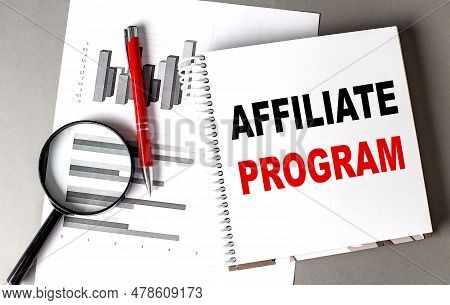 Affiliate Program Text Written On A Notebook With Chart