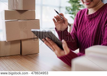 Successful Sme Entrepreneur. Asian Woman Working On Receipt Box And Check Online Orders. Business Sm