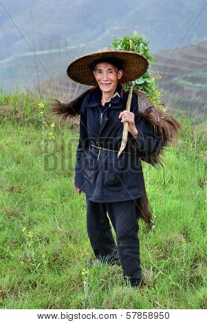 Chinese Peasant Shepherd Wearing Cloak An Animal Skin, Rural China.
